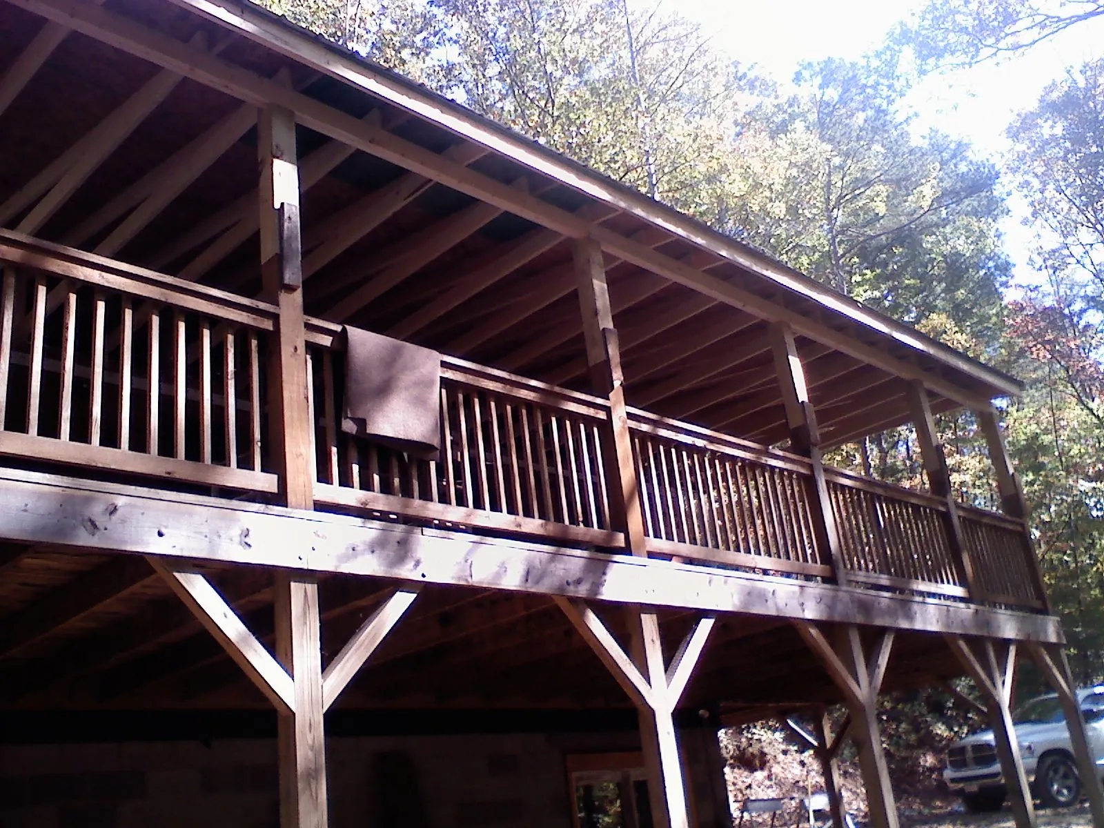 Timber framing under a new elevated porch and deck — Roof Leak Repair in Andrews by Roofing Brothers
